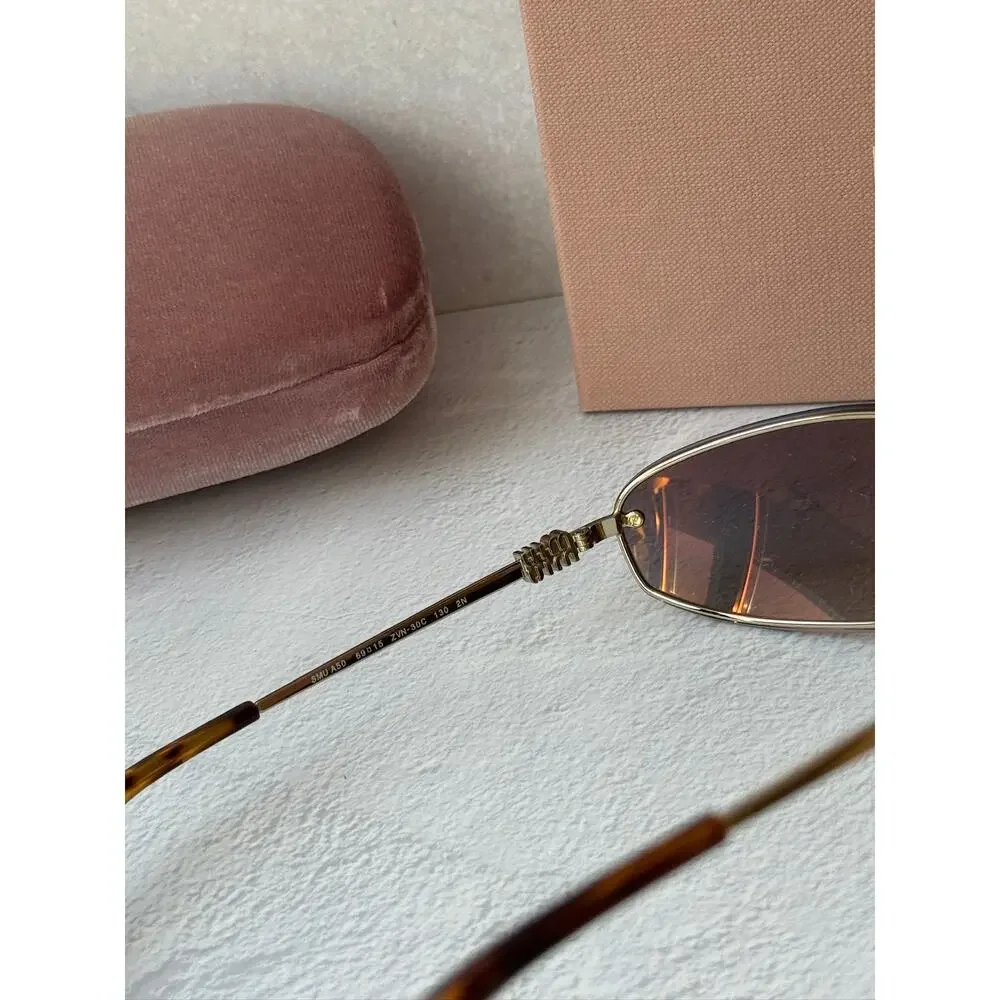 NEW Miu Miu MU A50S Wrap Sunglasses in Gold Grey $637